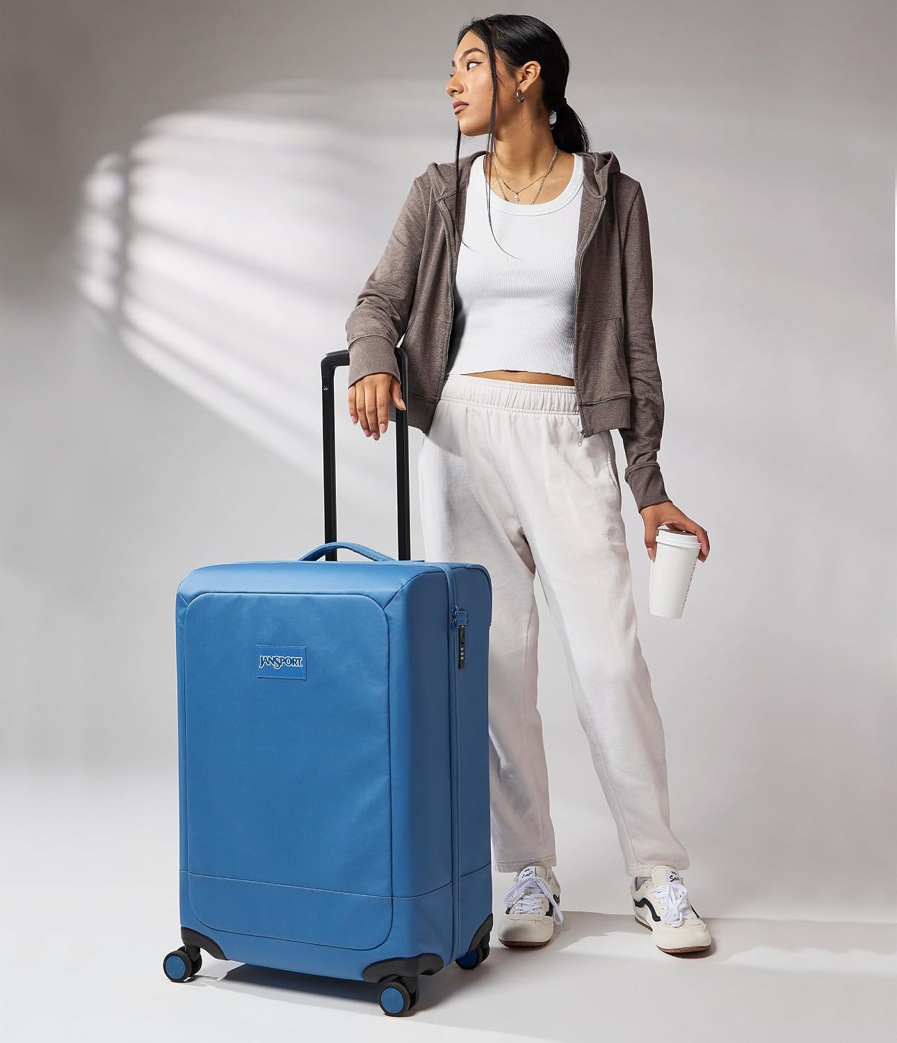 image:imageJanSport Good Latitude Carry On Spinner Suitcase 42L Water Resistant Travel Luggage with 16 Inch Laptop Sleeve Durable Lightweight Rolling Hardside Softside Carryon Bag Elemental BlueElemental Blue