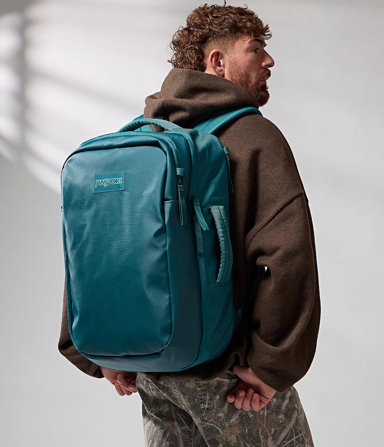 image:imageJanSport Good Latitude Travel Pack 40L Large Carry On Backpack AntiTheft Zippers amp 16 Inch Laptop Sleeve Weekender Bag for Travel Smokey GritEmerald Pool