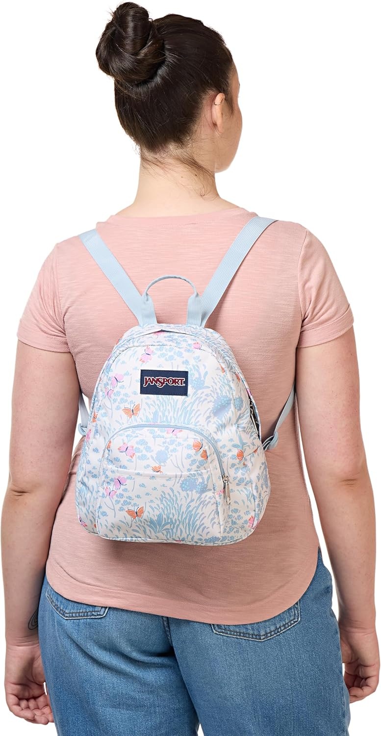 image:imageJanSport Half Pint Mini Backpack 102 L Durable Mini Bag Purse with Adjustable Shoulder Straps Single Main Compartment Zippered Stash Pocket BlackFluttering Fields