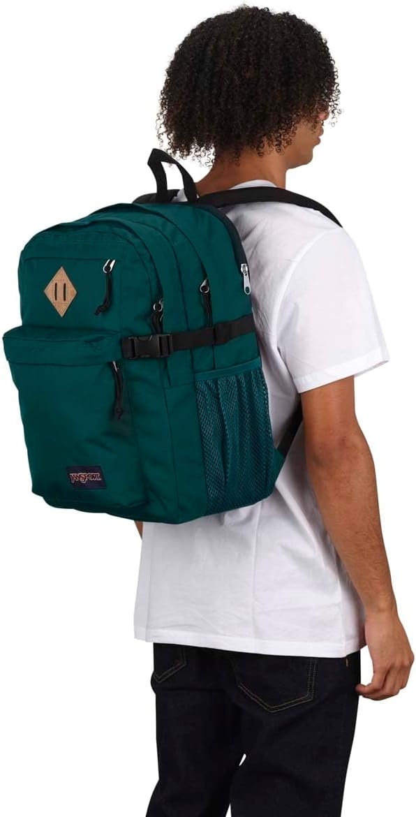 image:imageJanSport Main Campus Backpack Travel or Work Backpack with 15Inch Laptop Sleeve and Dual Water Bottle Pockets Surreal SwirliesDeep Juniper