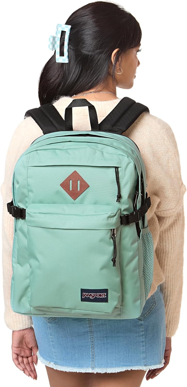 image:imageJanSport Main Campus Backpack Travel or Work Backpack with 15Inch Laptop Sleeve and Dual Water Bottle Pockets Surreal SwirliesFaded Sage
