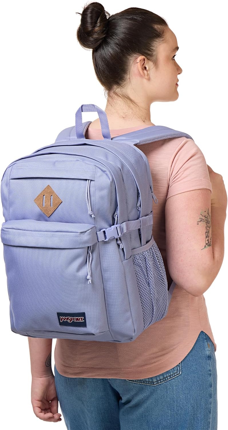 image:imageJanSport Main Campus Backpack Travel or Work Backpack with 15Inch Laptop Sleeve and Dual Water Bottle Pockets Surreal SwirliesLavender Ash