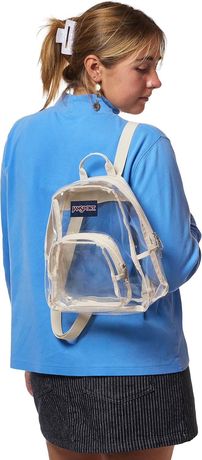 image:imageJanSport Mini Pack Lightweight 10L Backpack with Adjustable Straps and Front Zipper Pocket Perfect for Travel Concerts amp Everyday Use ClearMoon Flower