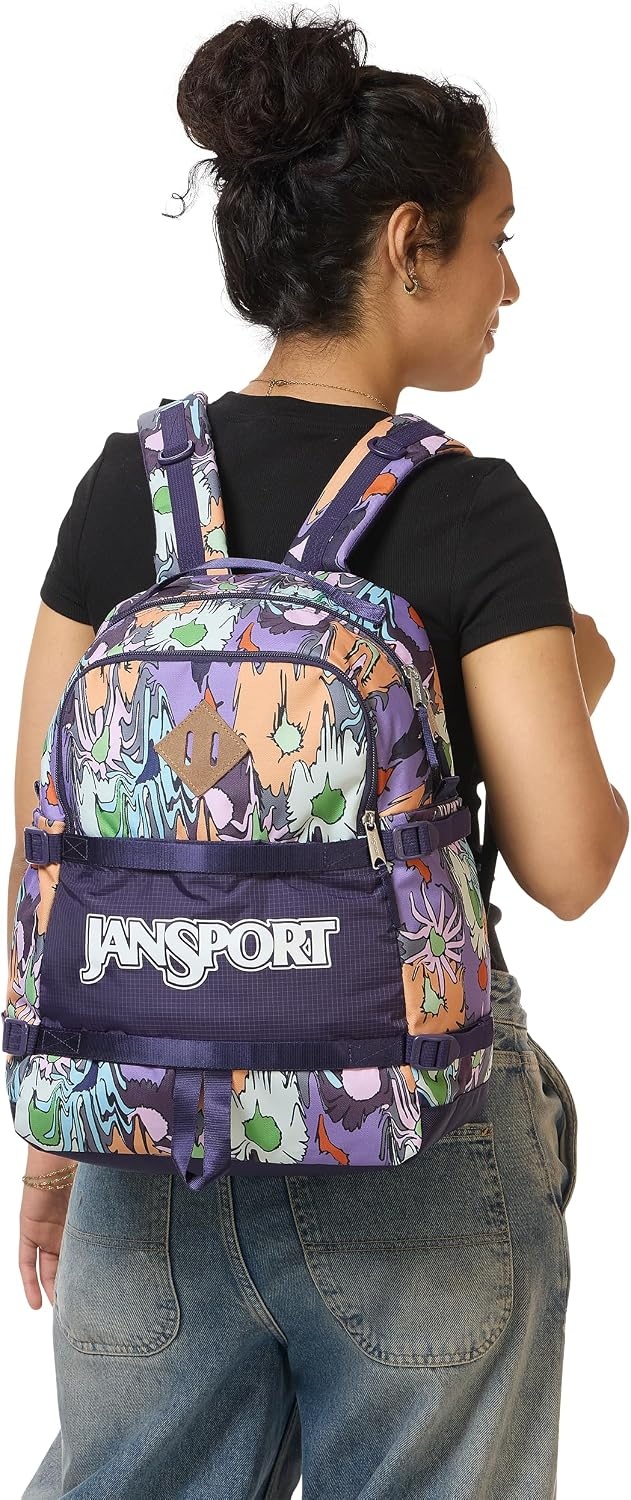 image:imageJanSport Small Seattle Pack Compact Backpack with Main Compartment Dual Water Bottle Pockets and Padded Sleeve for 15Inch Laptop BlackMelted Blooms Yellow