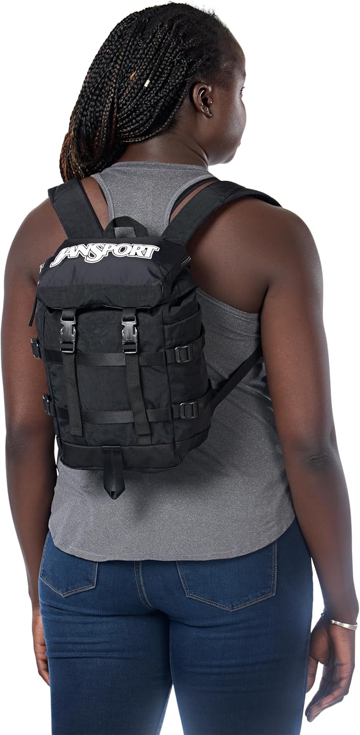 image:imageJanSport Mini Skip Pack Compact Backpack with Main Compartment Side Water Bottle Pocket and Zippered Accessory Pocket Jelly KellyBlack