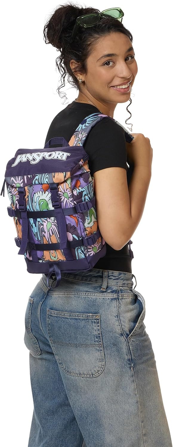 image:imageJanSport Mini Skip Pack Compact Backpack with Main Compartment Side Water Bottle Pocket and Zippered Accessory Pocket Jelly KellyMelted Blooms Yellow