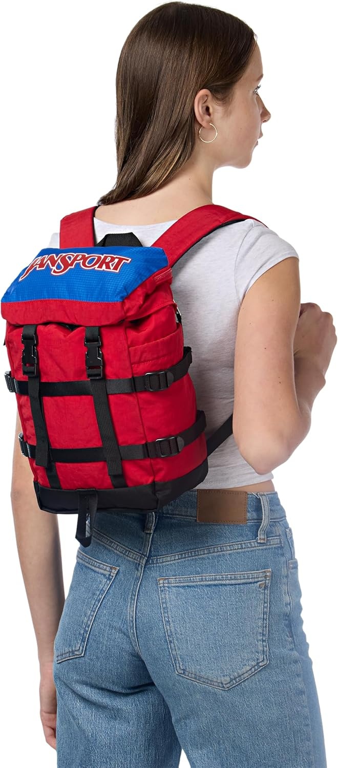 image:imageJanSport Mini Skip Pack Compact Backpack with Main Compartment Side Water Bottle Pocket and Zippered Accessory Pocket Jelly KellyRed Tape