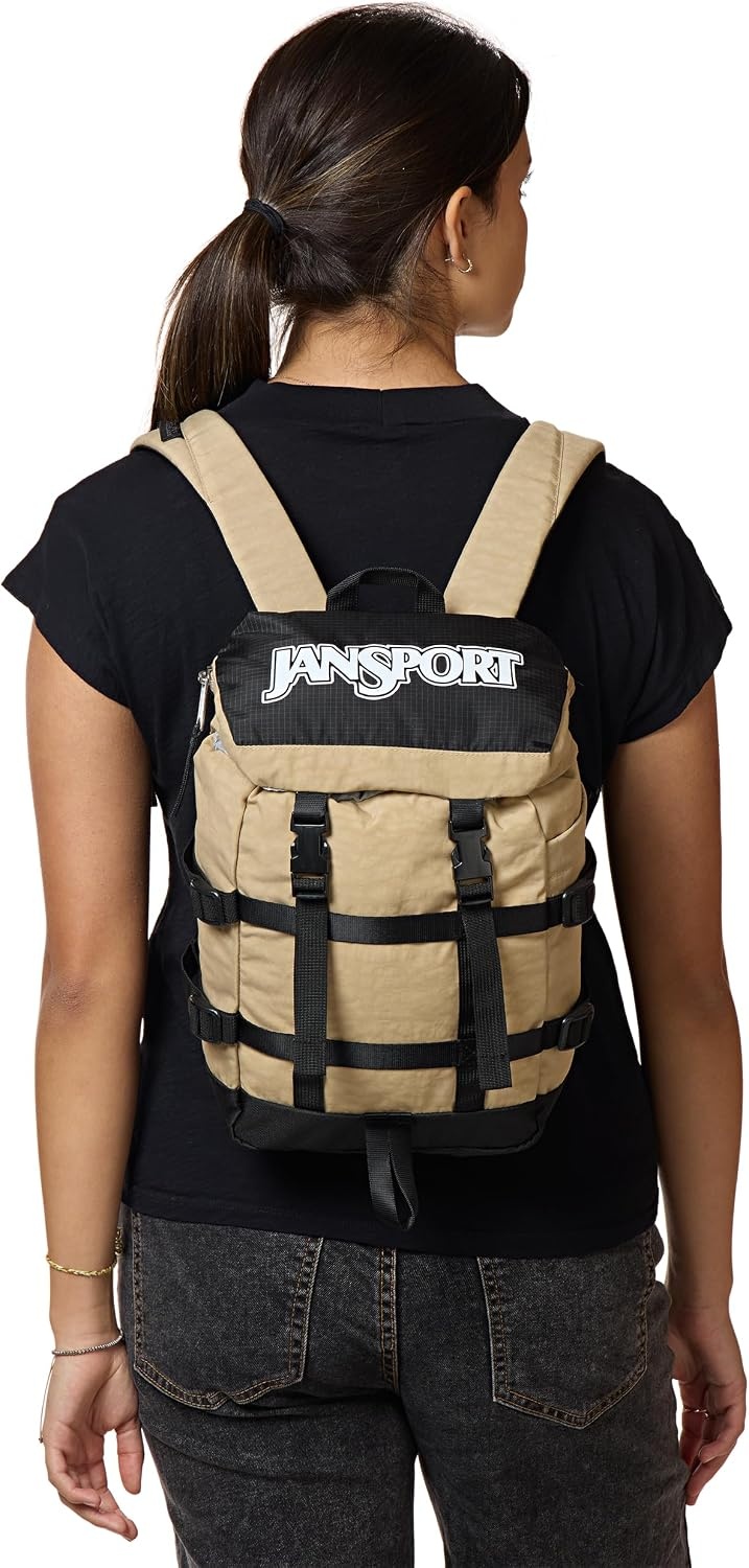 image:imageJanSport Mini Skip Pack Compact Backpack with Main Compartment Side Water Bottle Pocket and Zippered Accessory Pocket Jelly KellyTravertine