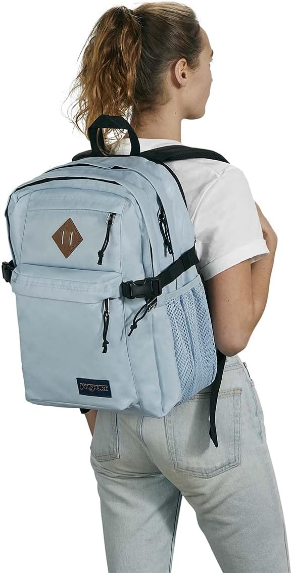 image:imageJanSport Main Campus Backpack Travel or Work Backpack with 15Inch Laptop Sleeve and Dual Water Bottle Pockets Sprayed Stars Pastel LilacBlue Dusk