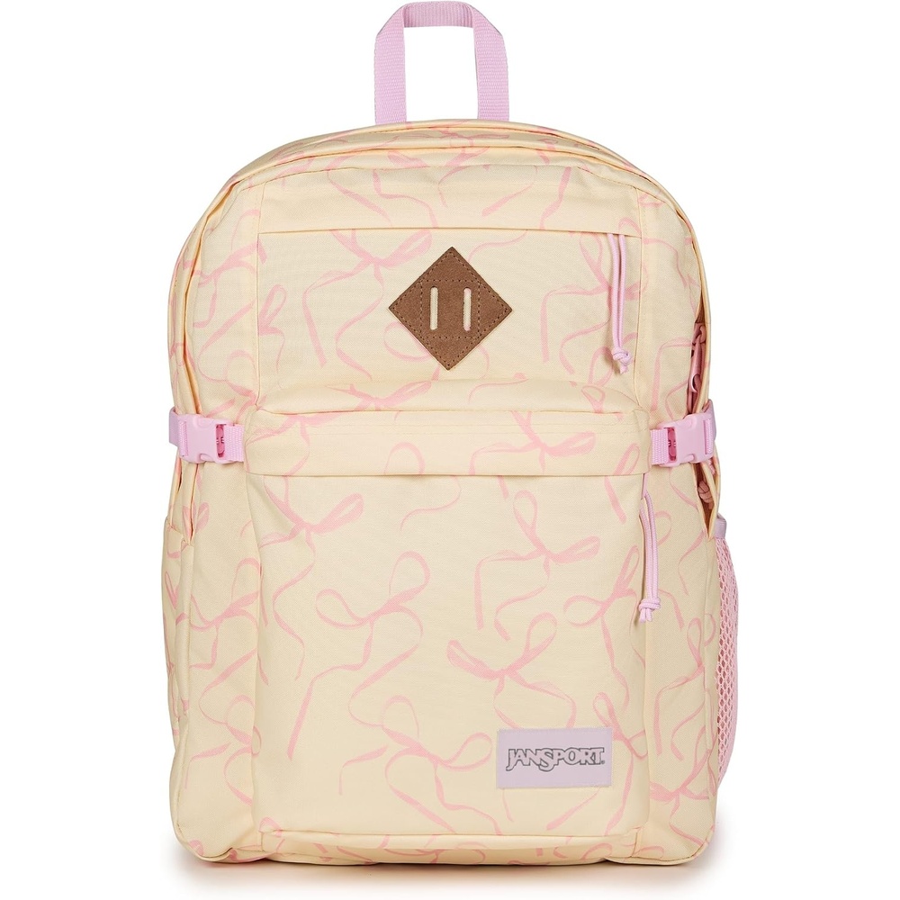 image:imageJanSport Main Campus Backpack Travel or Work Backpack with 15Inch Laptop Sleeve and Dual Water Bottle Pockets Sprayed Stars Pastel LilacRows of Bows NaturalPink Ice